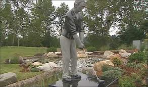 golfer in stream